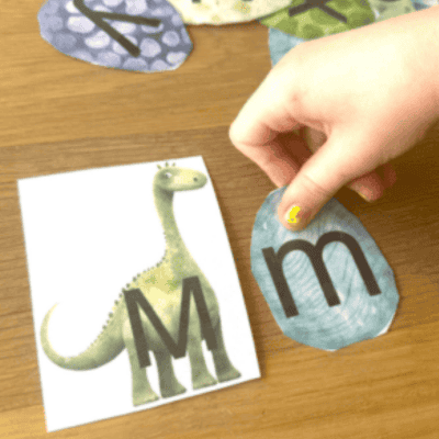 Dinosaur egg letter matching game for practicing alphabet recognition.